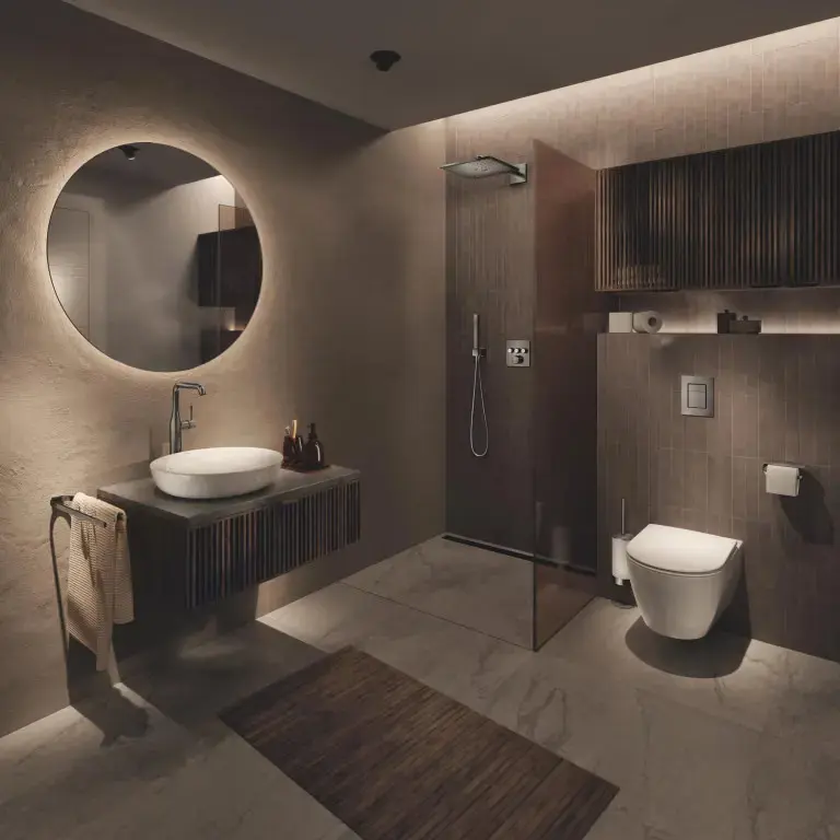 Sk grohe Modern bathroom with walk in shower and round mirror.